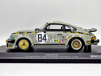 Minichamps 1979 Porsche 934 24hr LeMans Lois Livery 1:18 Scale - New